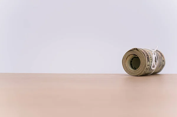 Dollar Banknotes Rolled Wooden Tabletop Text Space — 图库照片