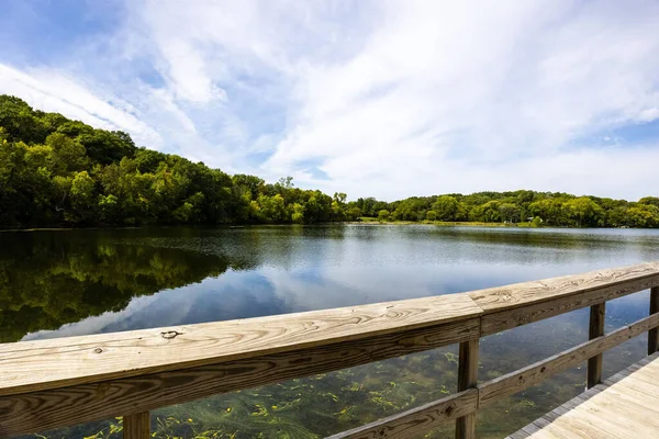 Wooden Bridge Reflective Clean Lake Carver Surrounded Dense Trees Minnesota — стоковое фото