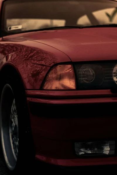 Vertical Shot Red Car Road Outdoors — Fotografia de Stock