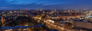 A panoramic shot of Hannover city at night in Germany clipart