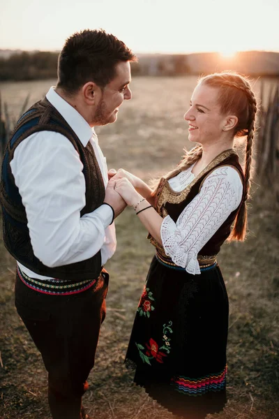 Vertical Shot Young Happy Beautiful Couple Traditional Serbian Costumes Holding — стокове фото