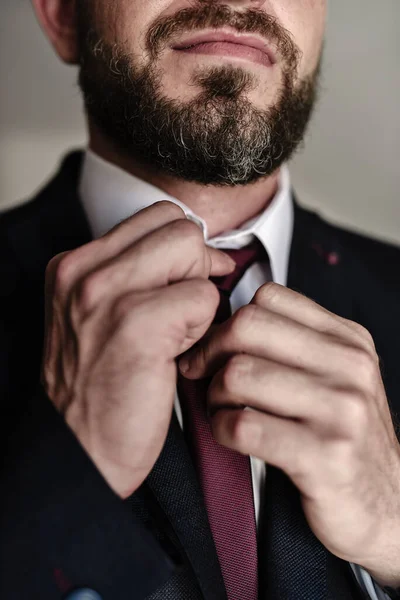 Vertical Shot Young Man Beard Fixing His Tie — Fotografia de Stock