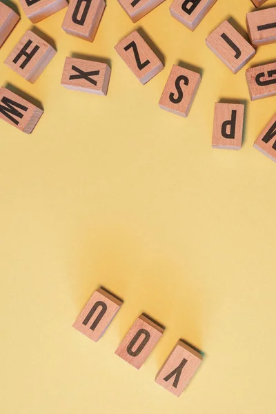 Word You Taken Pile Wooden Letter Blocks Yellow Background Copy — Stockfoto