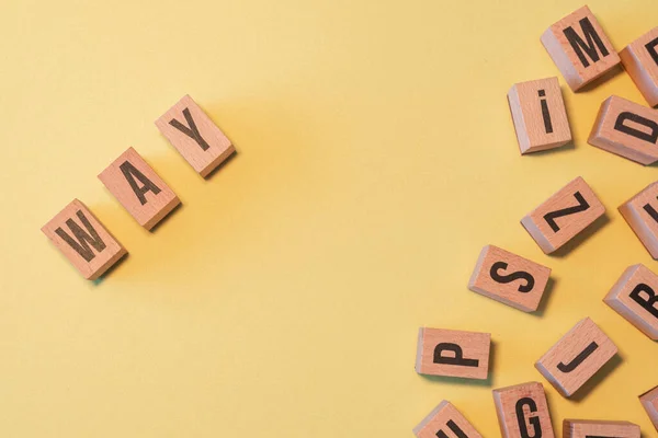 Word Way Taken Pile Wooden Letter Blocks Yellow Background Copy — Foto de Stock