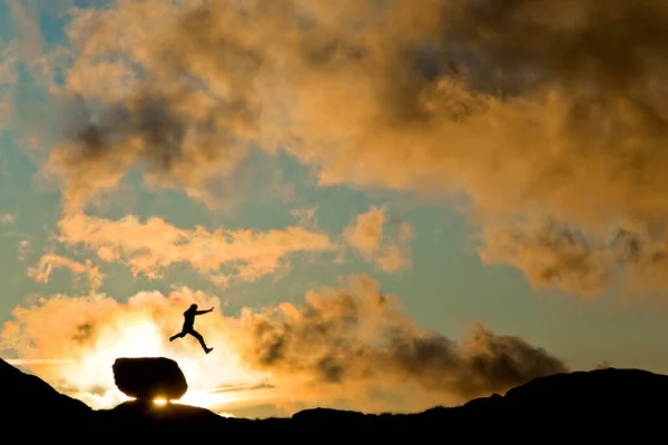 Silhouette Person Jumping Rock Hill Sunrise Norway — Stock Photo, Image