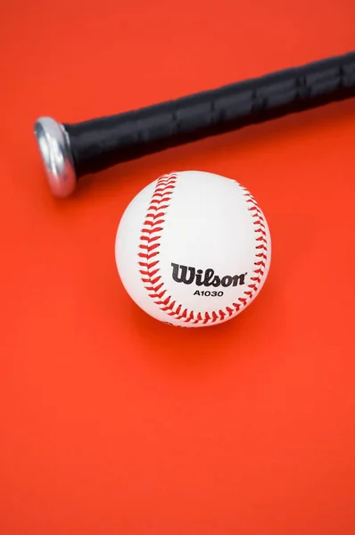 Inverigo Italy Dec 2021 Isolated Baseball Ball Bat Red Background — 스톡 사진