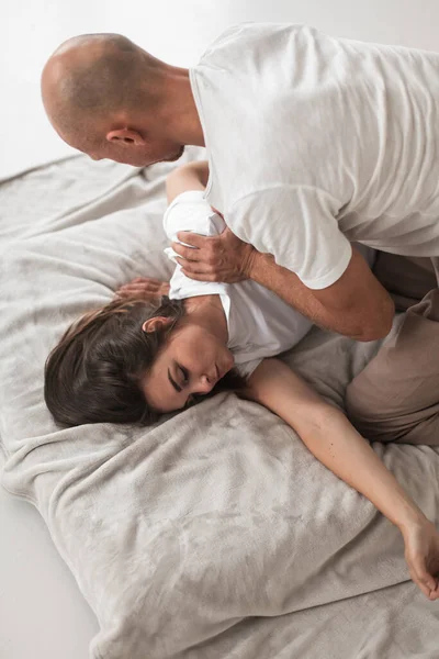 Professional Young Man Fixing Woman Shoulders White Cozy Room Manual — Fotografia de Stock