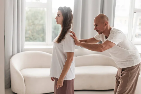 Professional Young Man Massaging Woman Back White Cozy Room Spa — Foto de Stock