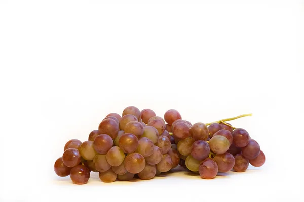 Een Close Shot Van Rode Druiven Witte Achtergrond Met Kopieerruimte — Stockfoto