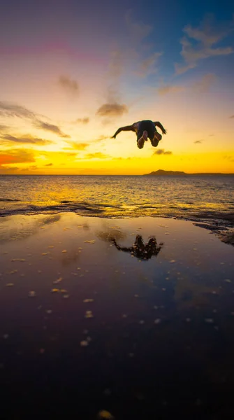 Beautiful View Caucasian Male Jumping Sea Cloudy Sky Sunset — Stock Photo, Image