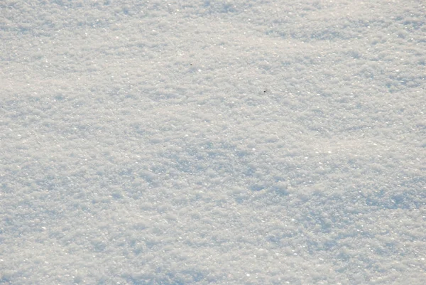 Tiro Close Uma Neve Com Pequenos Brilhos Sob Luz Sol — Fotografia de Stock