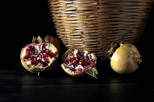 Pomegranates Wicker Basket Isolated Black Background — Stock Photo, Image