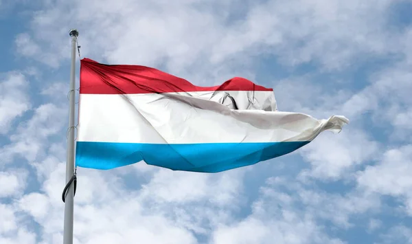 Luxembourg Flag Realistic Waving Fabric Flag — Foto Stock