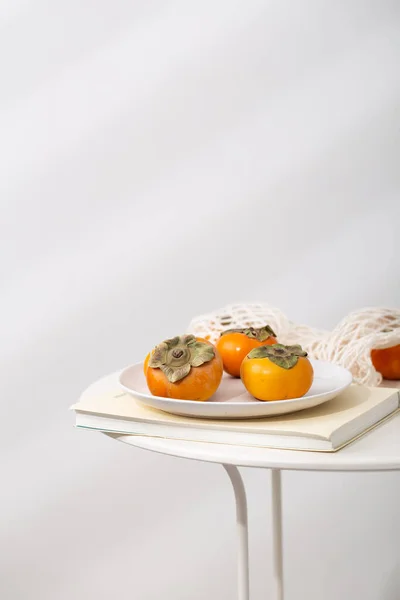 Closeup Shot Persimmon Fruits Plate — Stock Photo, Image