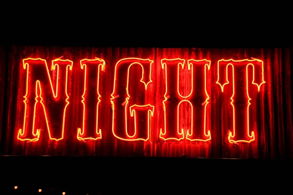Zbliżenie Czerwonych Neonów Napisem Nightt — Zdjęcie stockowe