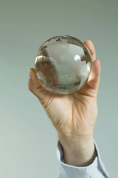 Closeup Person Hand Holding Glass Globe — Foto Stock