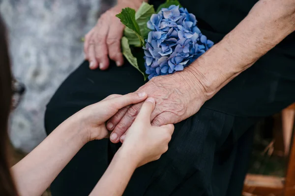 Closeup Shot Young Girl Hands Holding Elderly Woman Hands Giving — Stock Photo, Image