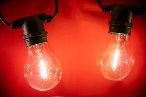 Beautiful Shot Two Light Bulbs Red Background — Stock Photo, Image