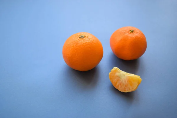 Two Mandarins Slice Blue Background — Stock Photo, Image
