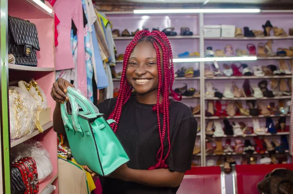 Black Beautiful Nigerian Girl Rasta Red Hair Holding Modern Handbag — стоковое фото