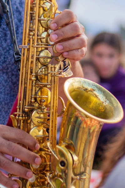 Vertical Shot Person Playing Saxophone Outdoor Festival Blurry Background — 图库照片