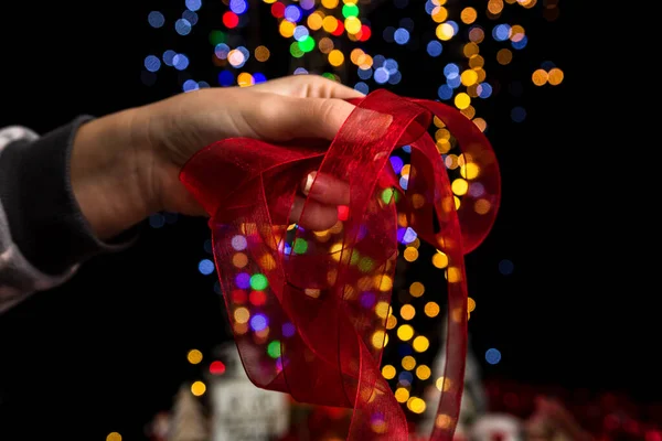 Person Holding Christmas Decoration Bokeh Lights Background — Stock Photo, Image