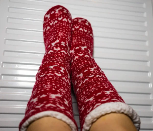 Woman Wearing Red Socks Warming Her Feet White Radiator — Stock Photo, Image