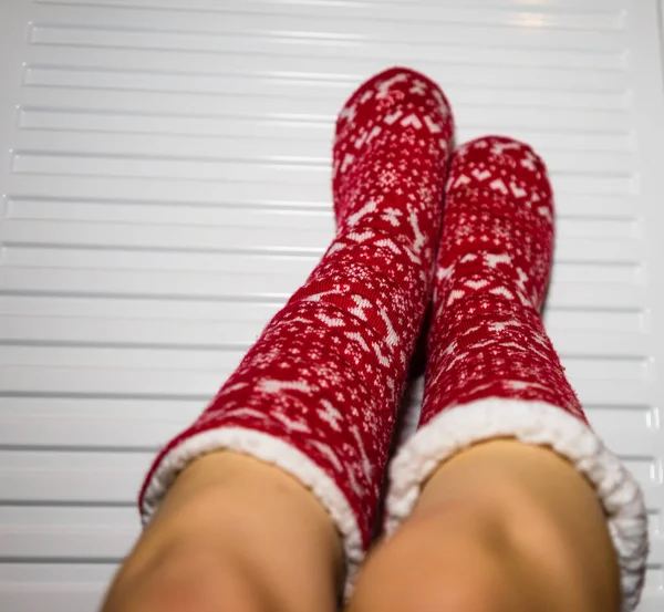 Woman Wearing Red Socks Warming Her Feet White Radiator — Stock Photo, Image