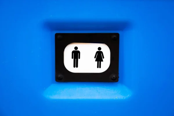 Symbol Men Women Hung Plastic Blue Surface — Stockfoto