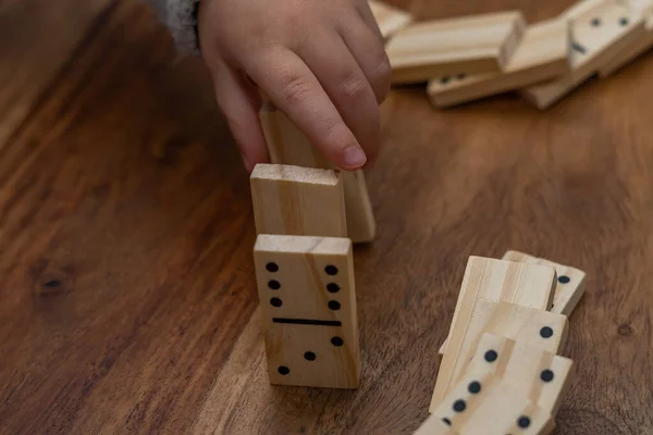 Child Hands Gray Sweater Playing Dominoes Blurred Focus — Stock Photo, Image