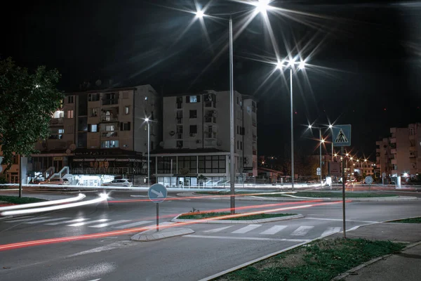 Illuminated Town Long Exposure Car Lights Road Midnight — Stock Photo, Image