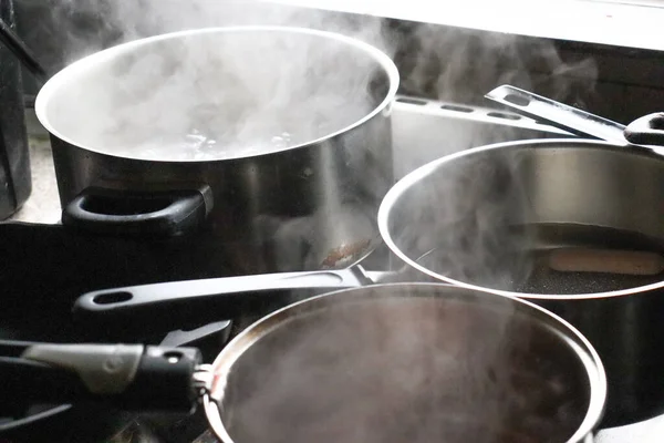 Closeup Shot Kitchenware Pans Pots Steam Going Pans Pots — Stockfoto