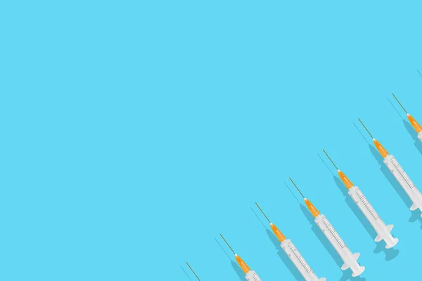 Syringes Isolated Blue Background Copy Space — Fotografia de Stock