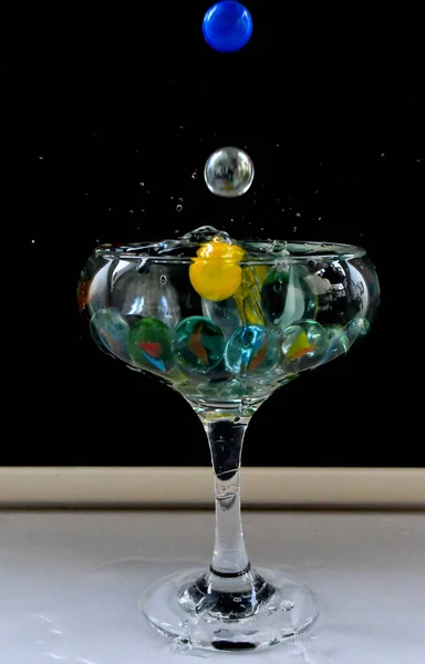 Glass Water Small Colorful Balls — Stock Photo, Image