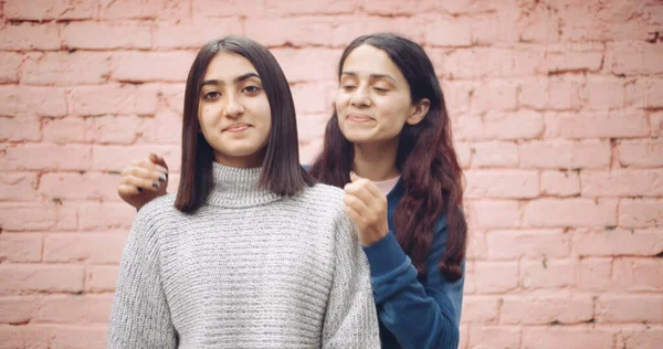 Female Friends Posing Camera Front Brick Wall — ストック写真