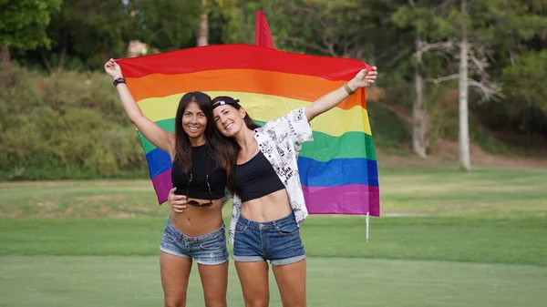 Young Beautiful Female Couple Lgbt Flag — 图库照片
