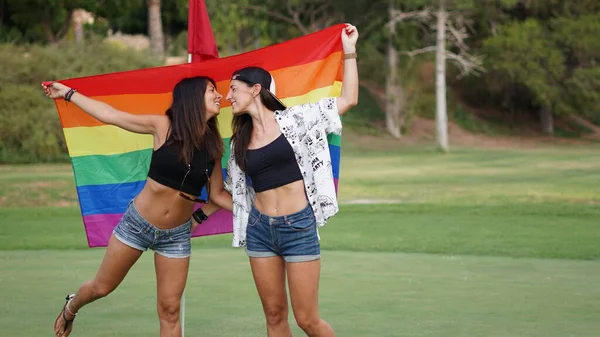Young Beautiful Female Couple Lgbt Flag — 图库照片