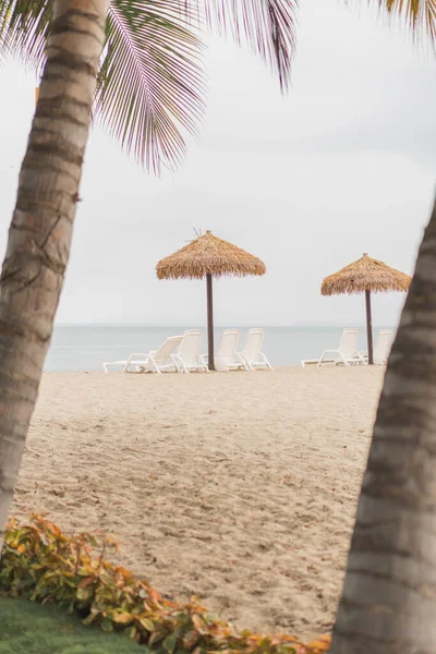 A vertical shot of the tourist family resort on the private beach of Punta Centinela in Ecuador