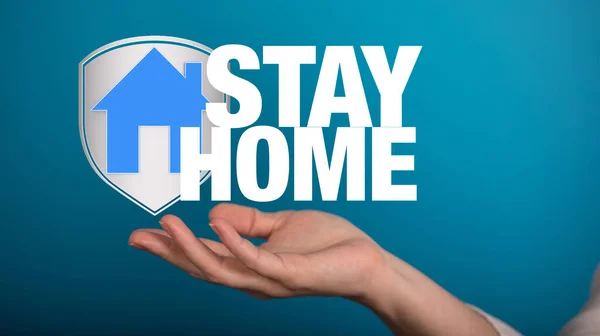 Woman Hand House Shield Stay Home Written Blue Background — Φωτογραφία Αρχείου