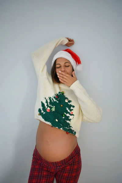 Young Pregnant Caucasian Female Santa Hat Sweater Christmas Tree — Stock Photo, Image
