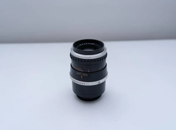 Closeup Camera Lens White Table —  Fotos de Stock