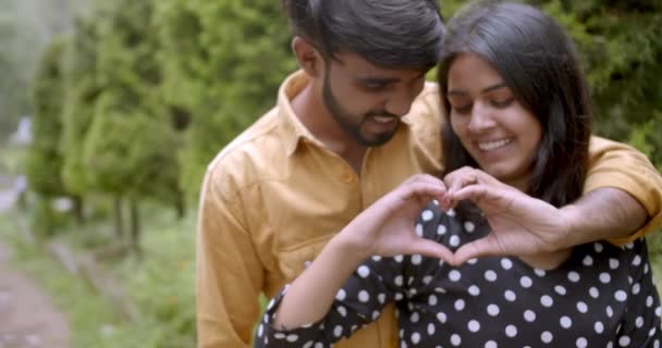 Indian Couple Park Making Heart Shape Hands — ストック動画