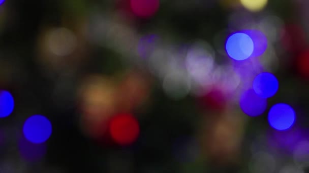 Weihnachtsbeleuchtung Verschwimmt Hintergrund — Stockvideo