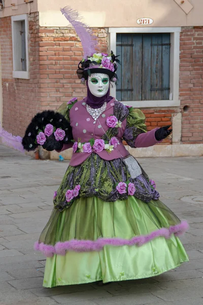 Venezia Italy Mar 2019 Masked Woman Flower Purple Green Colors — стокове фото