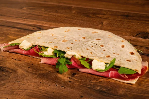 Salty Piadina Cured Meats Vegetables Wooden Surface — Stock Photo, Image