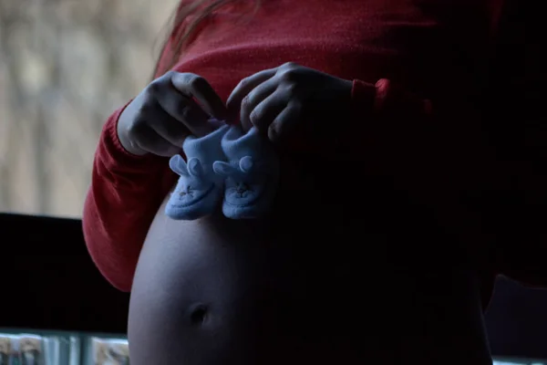 Pregnant Woman Boots Her Belly — Stock Photo, Image