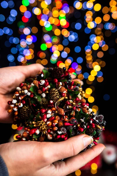 Holding Christmas Decoration Bokeh Lights Background — Stock Photo, Image