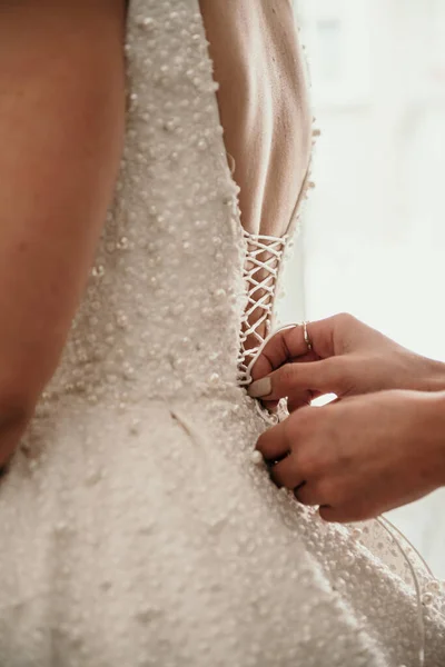 Close Female Hands Holding Wedding Dress — Stock fotografie