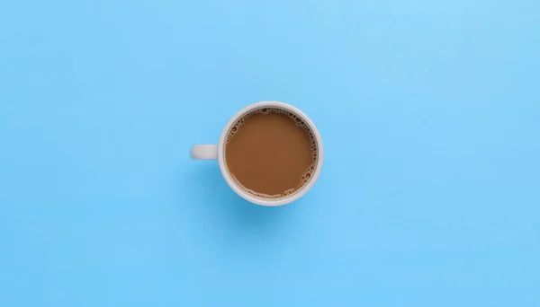 Una Vista Superior Una Taza Café Sobre Fondo Azul — Foto de Stock