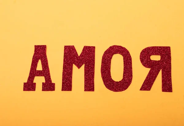 Słowo Amor Napisane Żółtym Tle — Zdjęcie stockowe